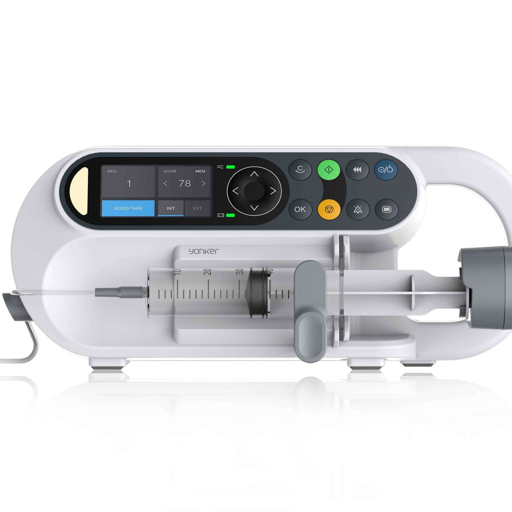 A medical syringe pump delivering precise medication doses to a patient.