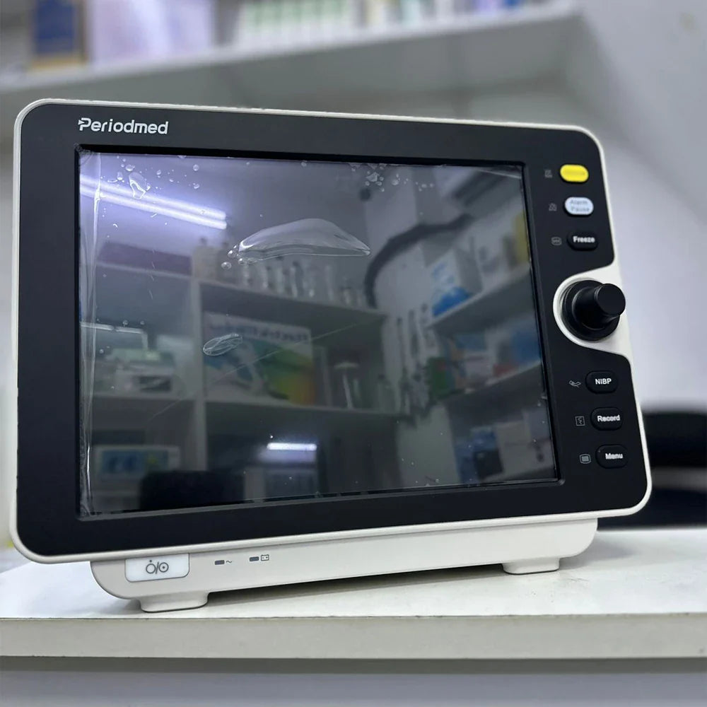 Patient monitor in Dubai displaying ECG, SpO₂, and vital signs in hospital setting